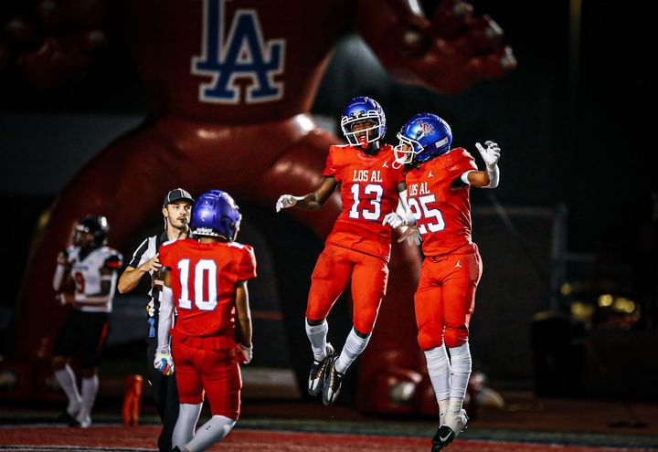 Los Alamitos wide receiver #13 Ja’Myron Baker scored two touchdowns in the team's win over the Huntington Beach Oilers. Photo