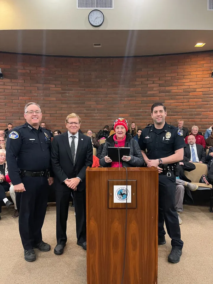 Retiring crossing guard Betty Camacho is honored at the Seal Beach City Council meeting on Dec. 12 for her 28 years of servic