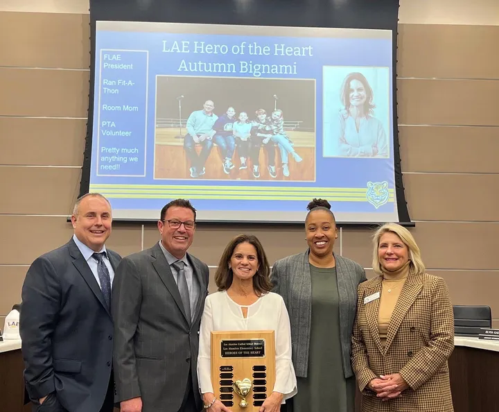 Parent volunteer Autumn Bignami was named L.A.E.'s 'Hero of the Heart' for 2022-23. Pictured from left to right: Los Al USD's