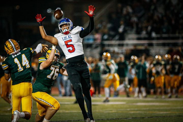 Los Alamitos High School's defensive end Ryder Trujillo stands tall in Griffins' 52-27 victory over the undefeated Edison. Ph