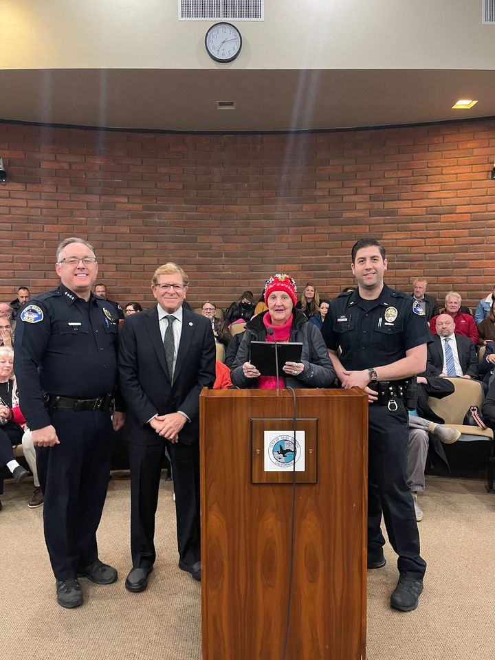 Retiring crossing guard Betty Camacho is honored at the Seal Beach City Council meeting on Dec. 12 for her 28 years of servic