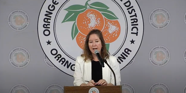 Former State Senator Gloria Romero speaks during public comment at the July 24 meeting of the Orange Unified School District