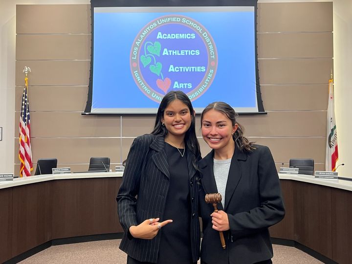 Outgoing Los Alamitos USD student board member Alexa Dharmapalan (left) and Joelle Kaiser (right), the student board member f