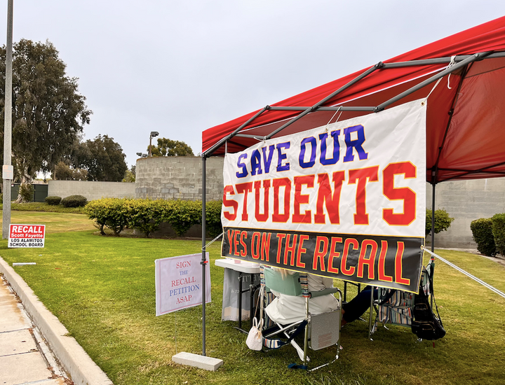 Supporters of an effort to recall Los Alamitos USD Board of Education member Scott Fayette outside the Seal Beach Tennis & Pi
