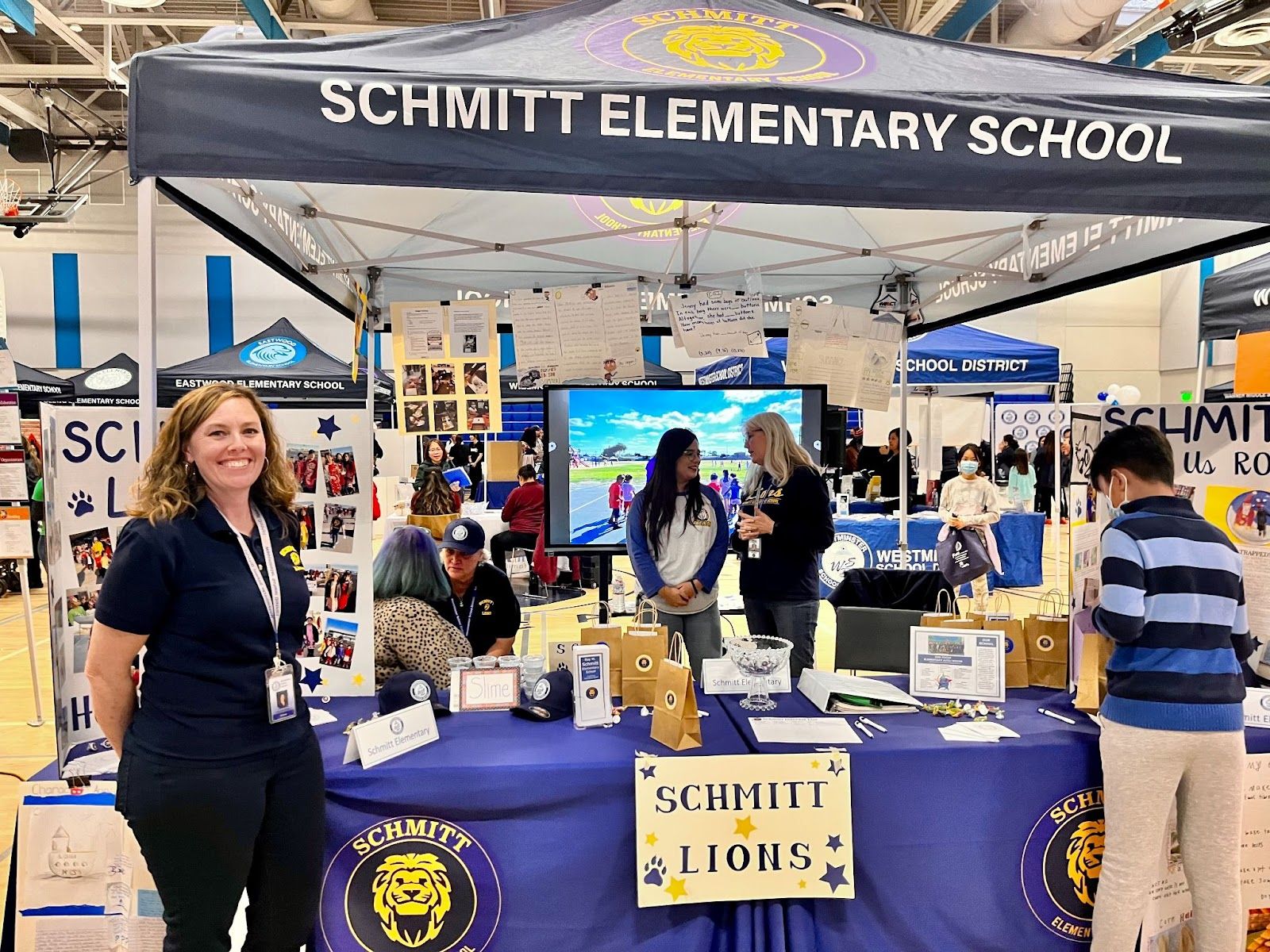 Schmitt Elementary School Principal Sarah Nead-Rendon poses in front of her school's canopy at the Westminster School District's first Academic Innovation Showcase. Photo by Jeannette Andruss.