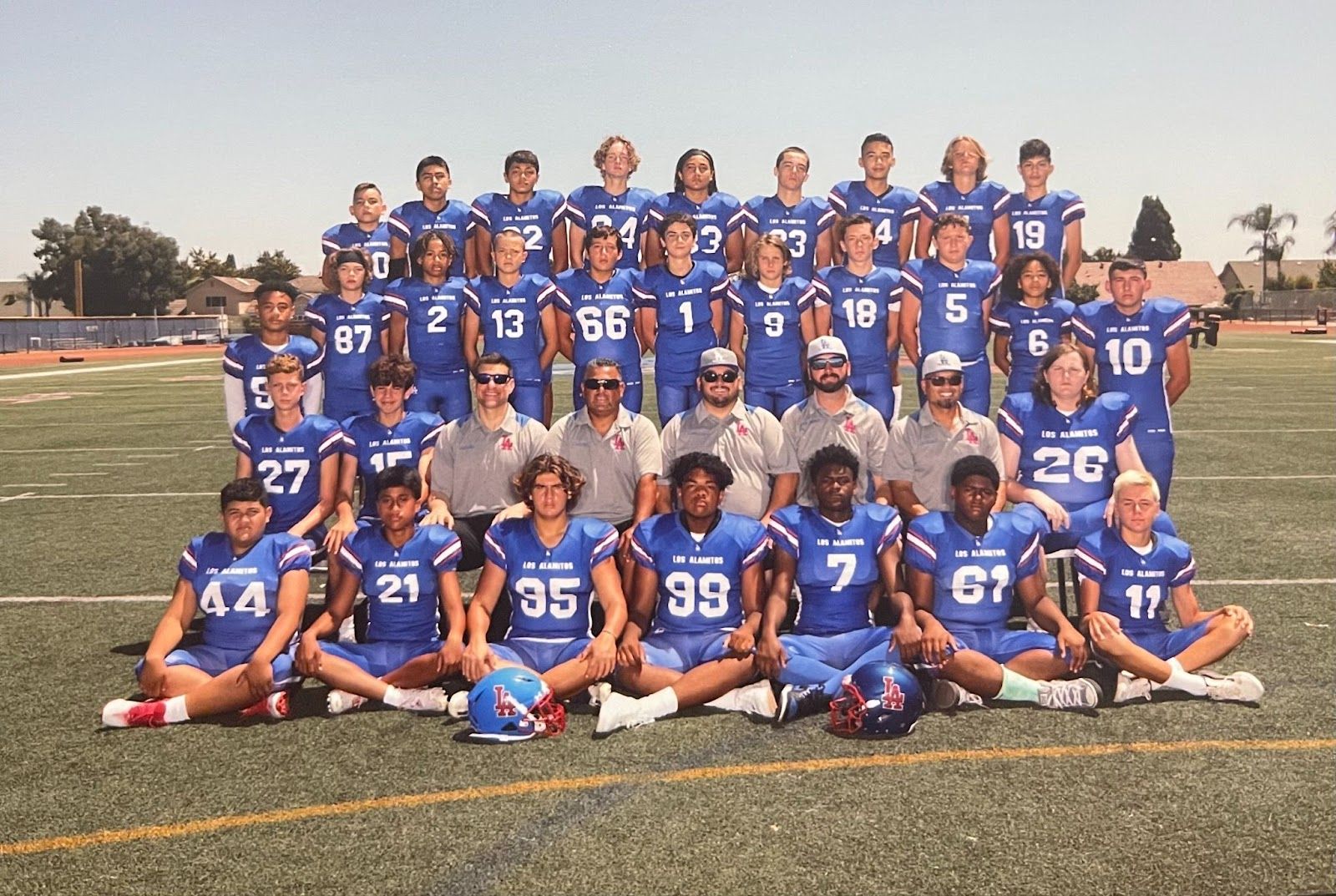 Los Alamitos Pop Warner Blue Griffins include: Kaleb Aiava #21; Marco Alvillar #18; Jaiden Anthony #2; Tate Belfanti #11; Ethan Booker #6; Maximus Cantrell #13; Caden Chavez #1; Zackery Dickison #20; Isaac Felipe #19; Gabriel Frias #16; Hero Glowaki #9; Ashton Gogue #14; Joe Hamby #26; Braydon Johnson #4; Courtney Jr. Mariner #7; Cash Matlock #10; Oscar Ocampo #3; Caleb Ota #22; Matteo Palma #66; Palati Robertson #55; Wyatt Sanchez #95; Leo Swietlikowski #27; Josiah Tafea #33; Cade Tessier #84; Marques Torres #99; Jordan McInnis #5; Timothy Wurmlinger #15; Aiden Britton #87; Noah Diaz #57; and Tyler Fox #52. Coaches include, head coach Jonathan Dickison and assistant coaches David Gogue, Cameron Britton, David Dickison, Mike Wurmlinger, and Marc Alvillar. Courtesy photo.